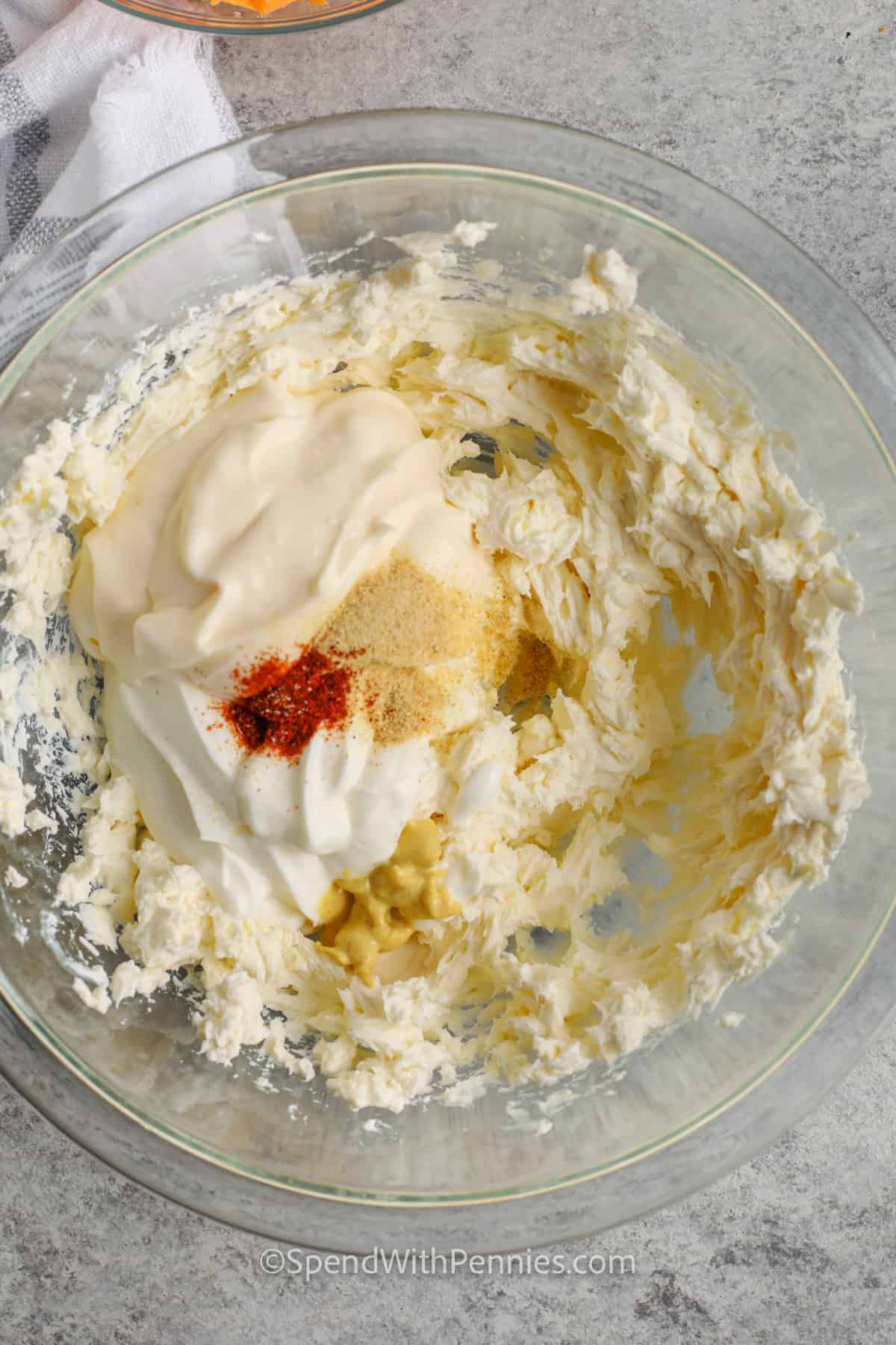 ingredients in a bowl to make Cheese Dip