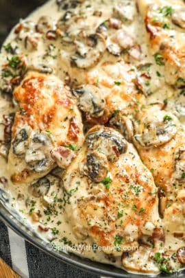 Closeup of Chicken and Mushrooms with Bacon in a pan