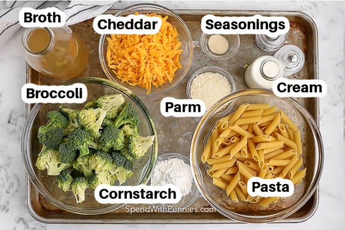 ingredients for broccoli pasta on a pan