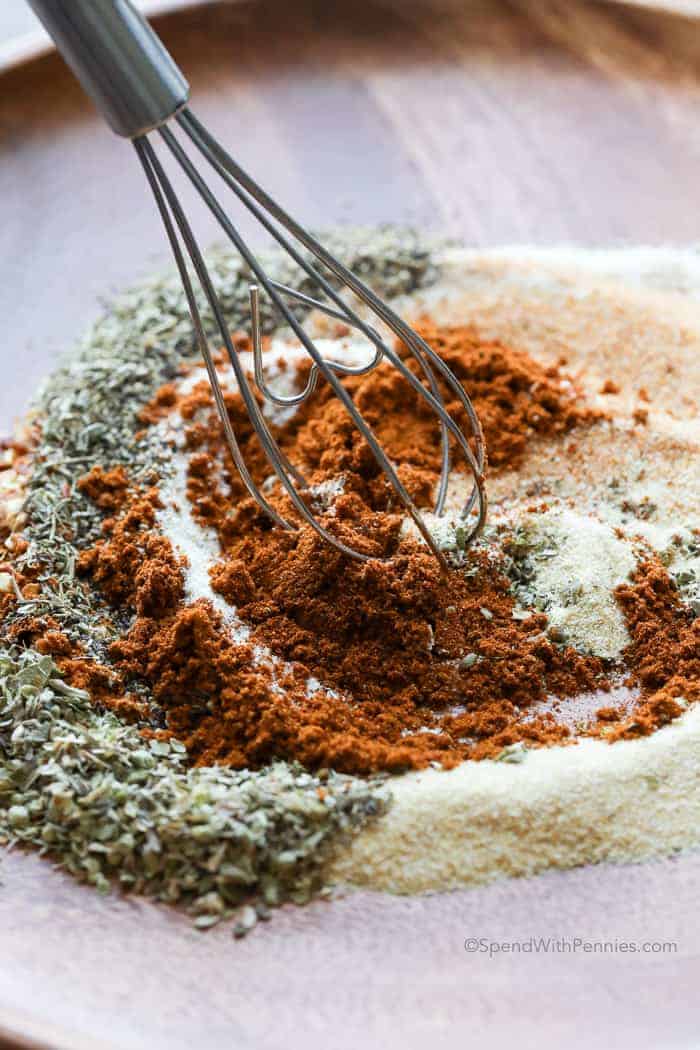 Cajun Seasoning ingredients being mixed with a whisk