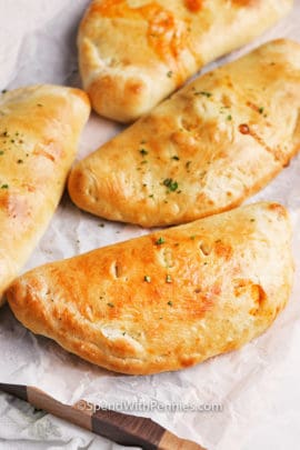 Calzones on parchment paper