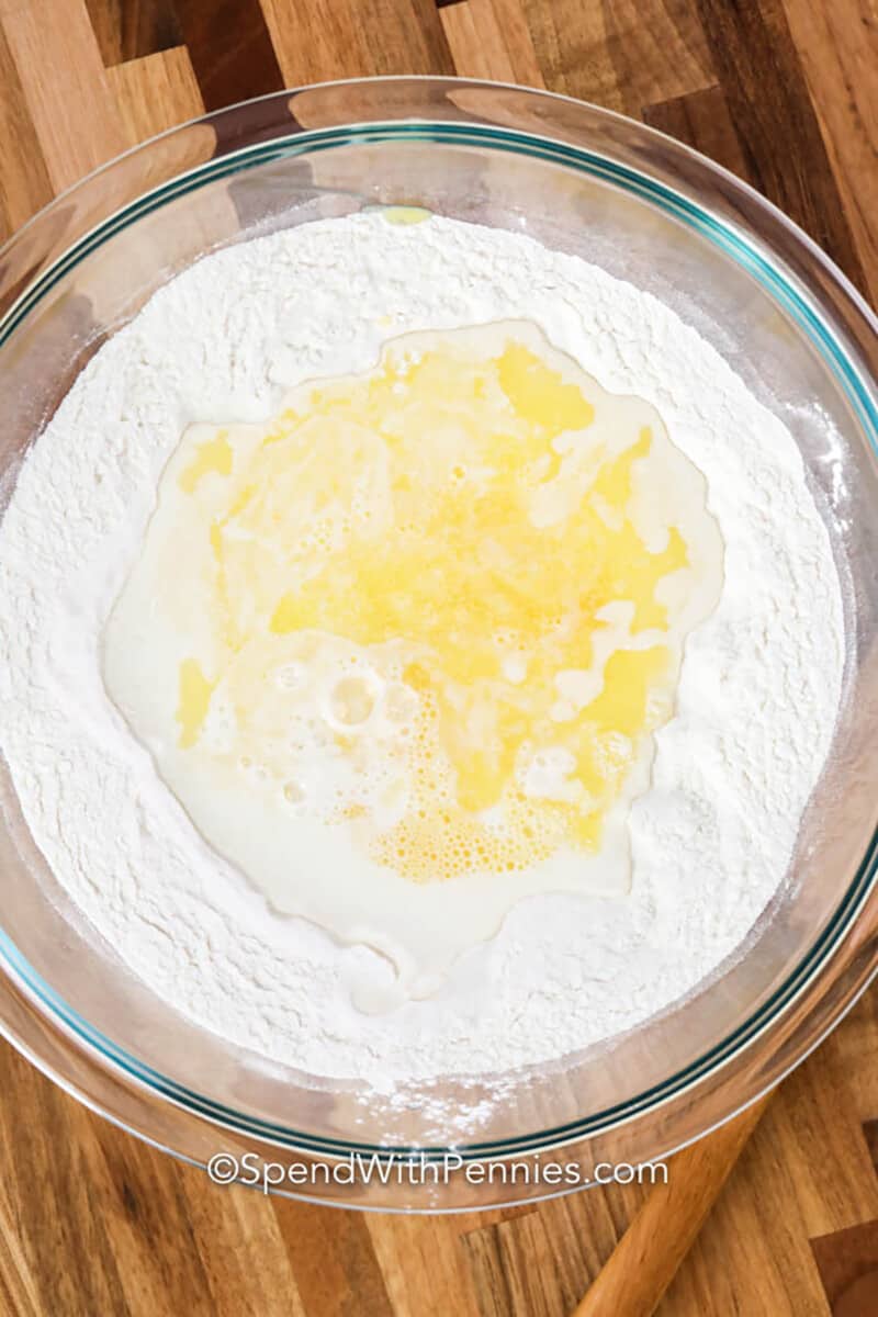 adding ingredients together to make Fluffy Pancakes