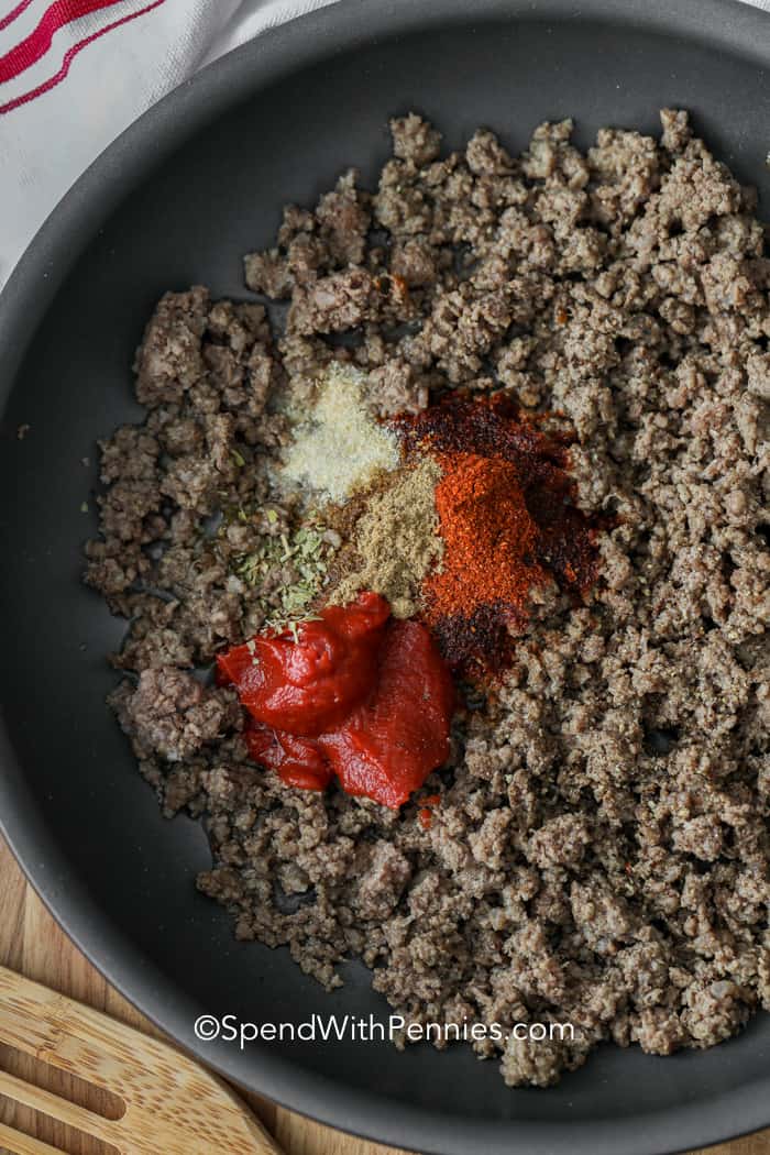 Ground beef and seasoning in a pan for ground beef tacos