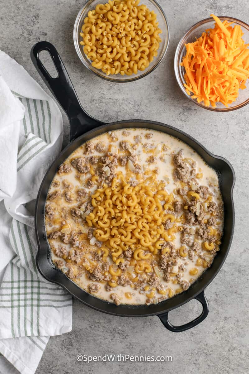 macaroni added to in a cast iron pan