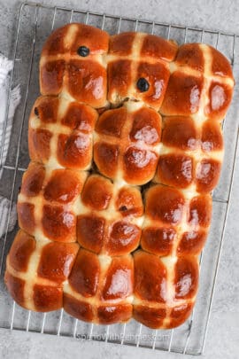 Hot Cross Buns cooling on a baking rack