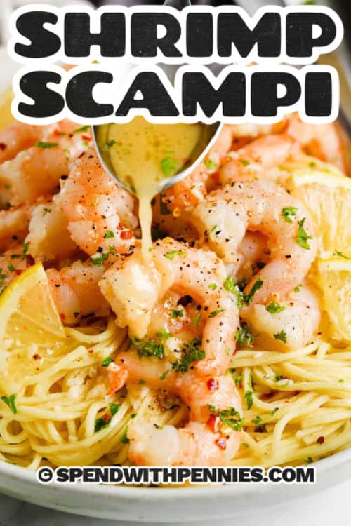 plate of Easy Shrimp Scampi Recipe with lemon slices and a title