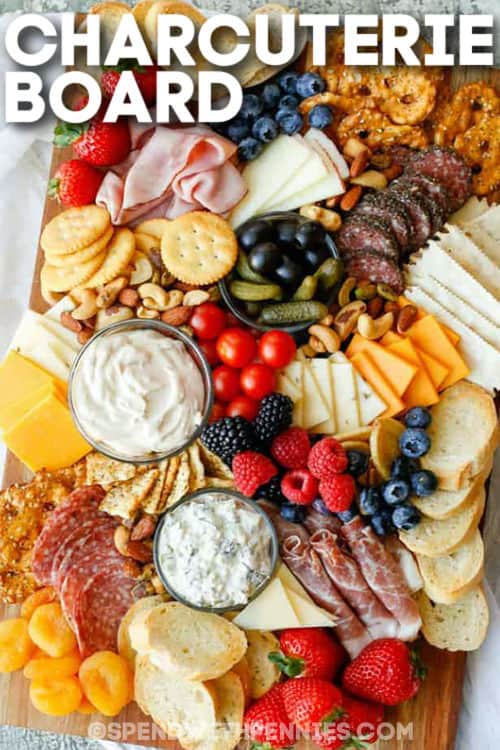 food on a board to show How to Make a Charcuterie Board with a title