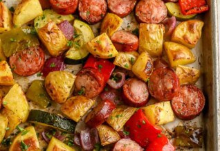 Roasted Sausage and Potatoes on a baking sheet