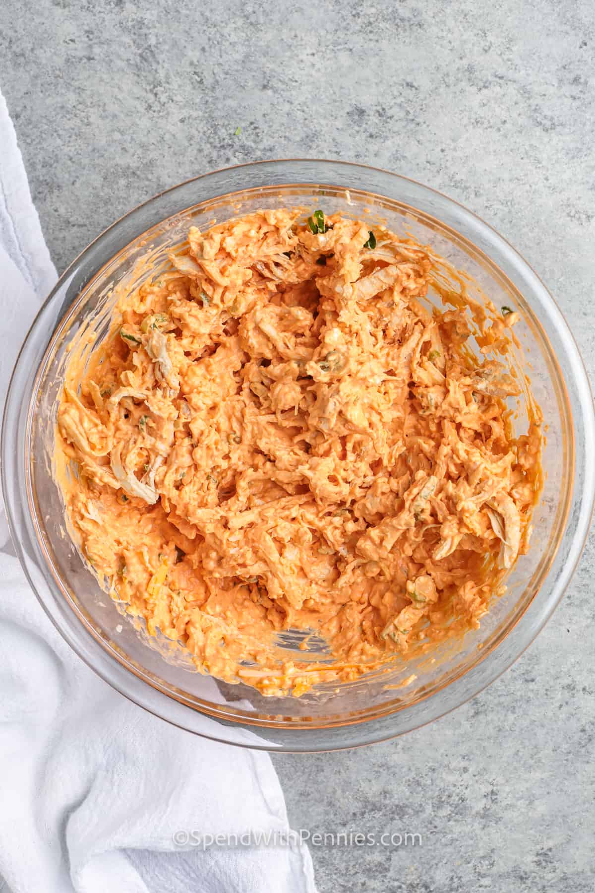 mixed ingredients to make The Best Buffalo Chicken Dip